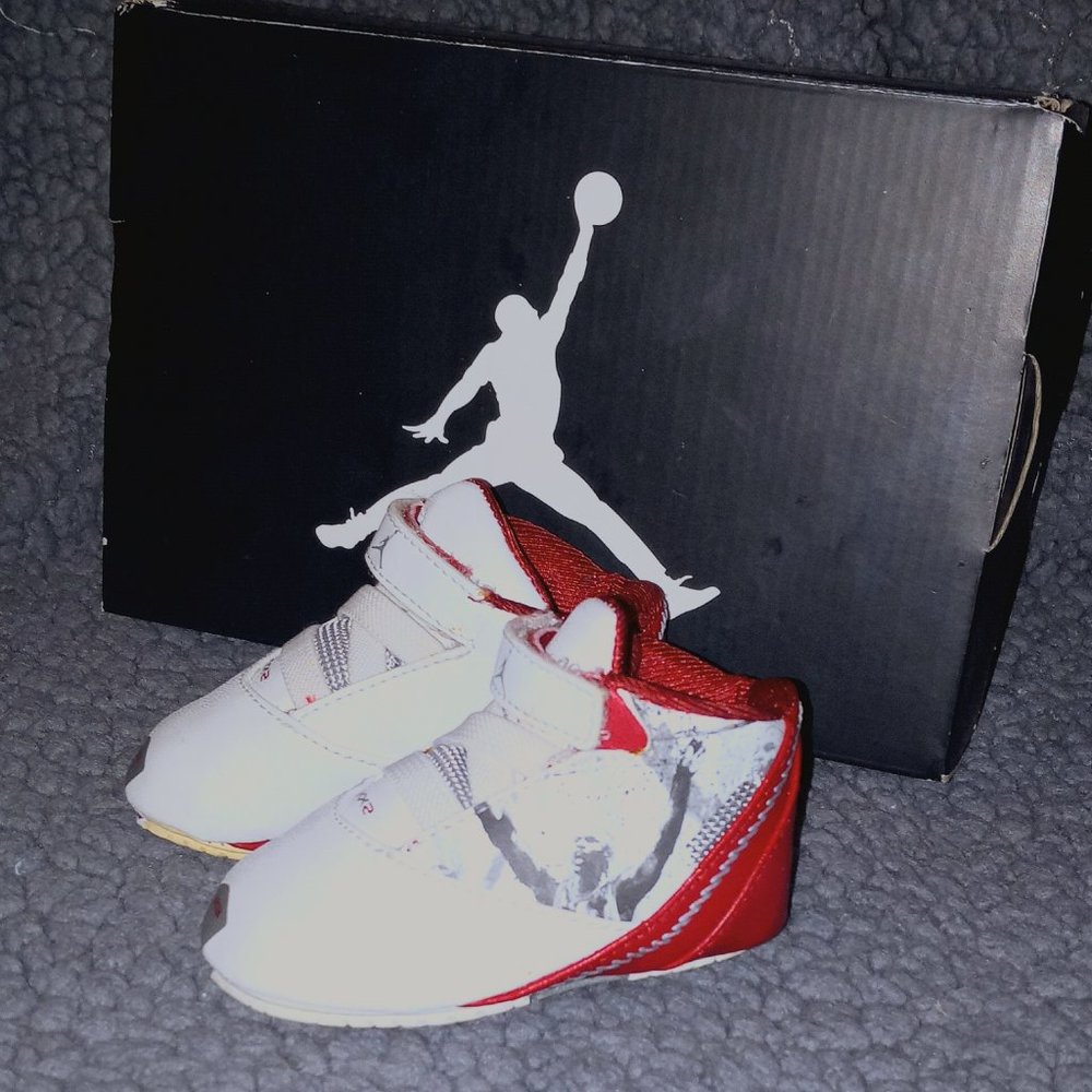 White black and red Jordan flight size 6c (newborn)